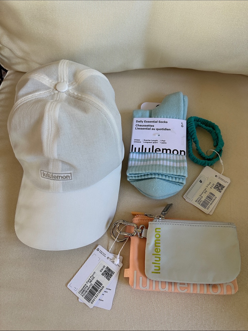 lululemon Off White Baseball Cap, Mint Socks, 2 Teal Hair Ties, 2 Card Pouches